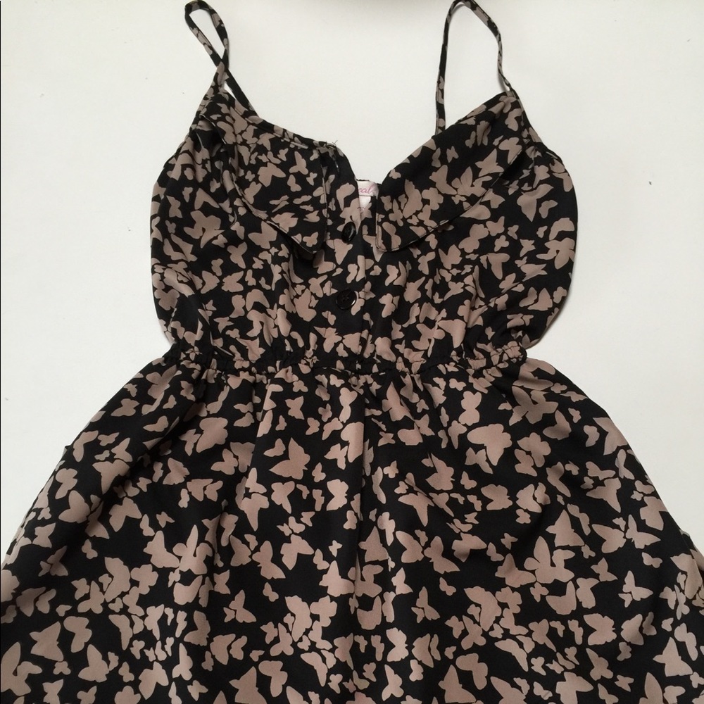 Adorable butterfly romper.